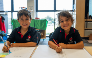 Two Sacred Heart Matraville students learning and on their way to 2026 NAPLAN success